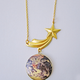 Illustration for article titled Celebrate Your Love of Space With This Solar System Necklace